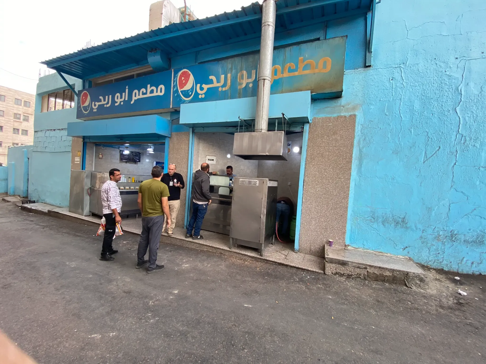 Abu Rebhi restaurant storefront in Aqaba