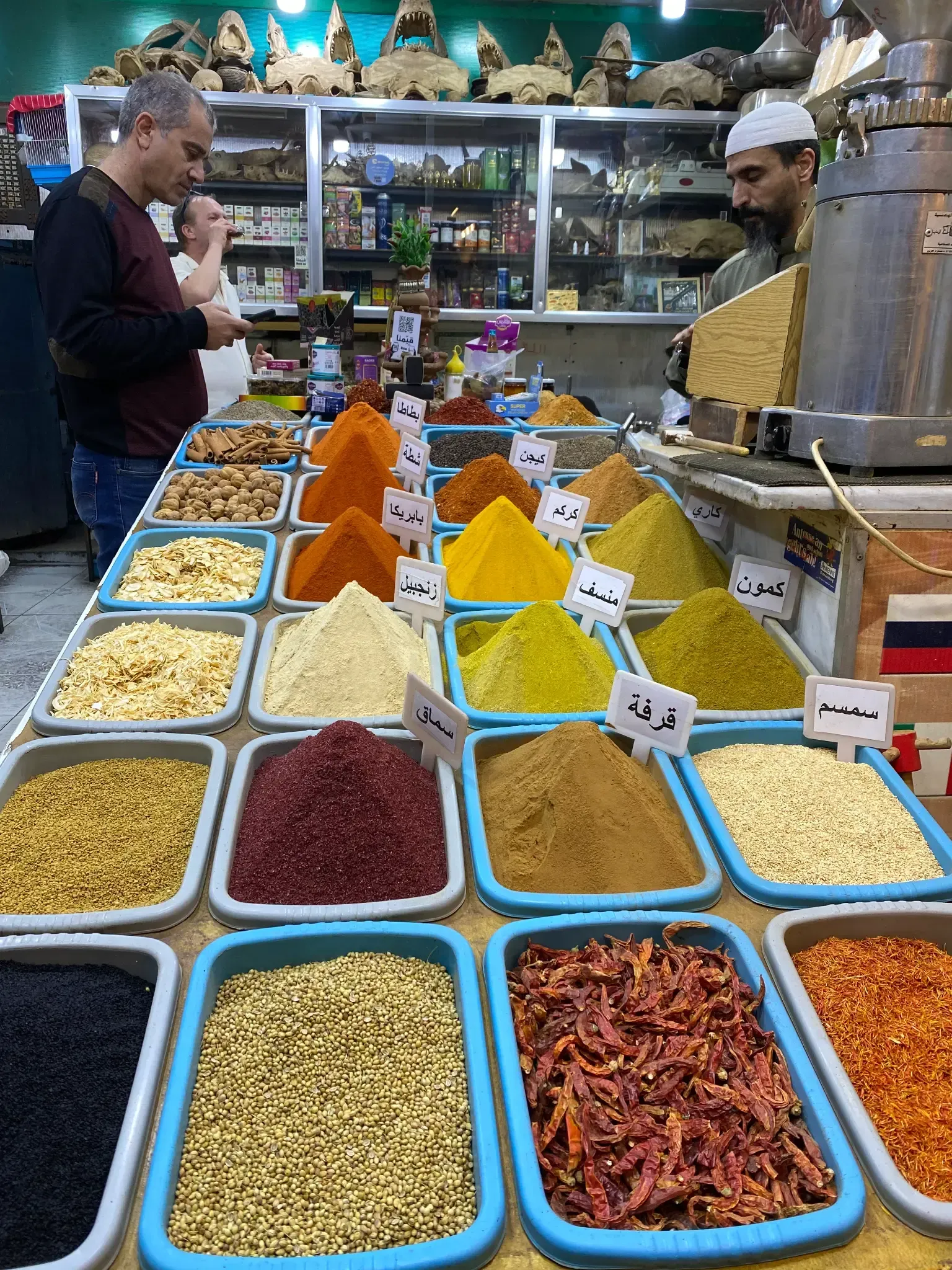 Colorful spices displayed in Aqaba's souk