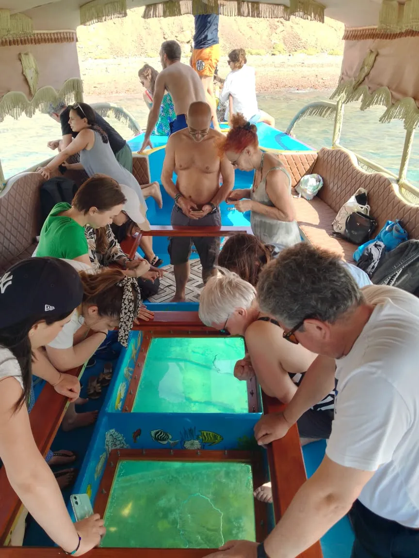 Glass bottom boat over a coral reef