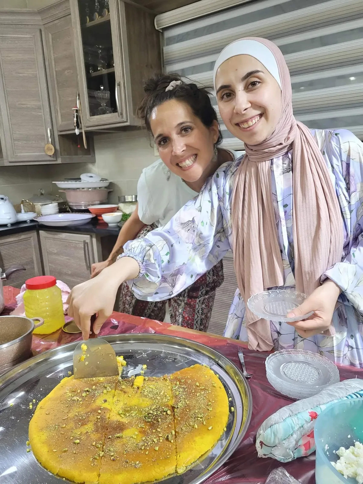Guests preparing Mansaf.